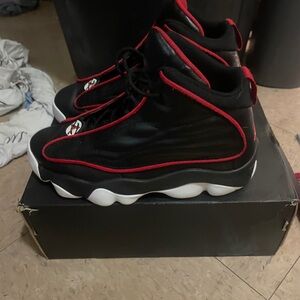 Jordan Pro Strong in the "Black University Red" colorway